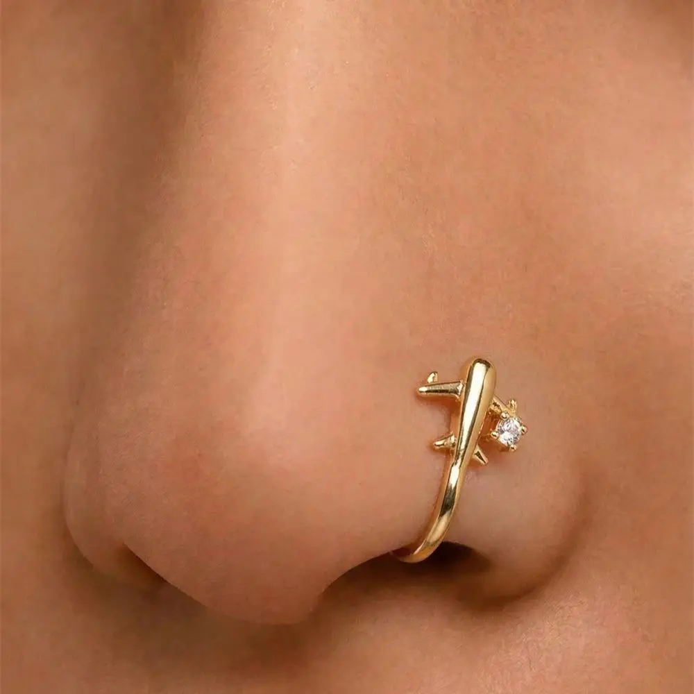Body Jewelry Hot - คลิปหนีบจมูกดีไซน์รูปเครื่องบิน 1 ชิ้น ไม่ต้องเจาะจมูก สำหรับสวมใส่ในชีวิตประจำวัน งานปาร์ตี้