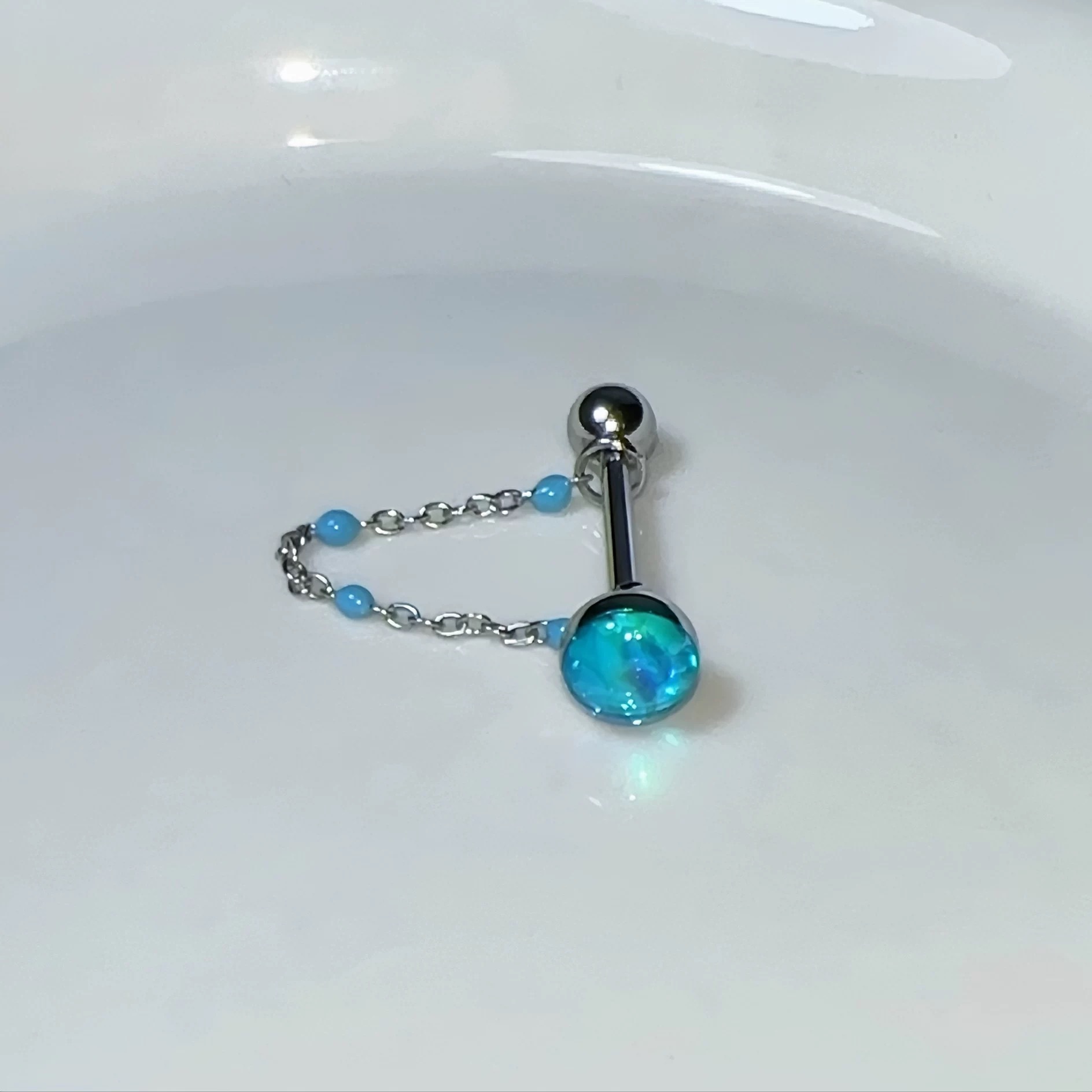 จิวเจาะลิ้นไทเทเนียมสตีลพร้อมโ - Body Jewelry Hot บทวิจารณ์และราคา